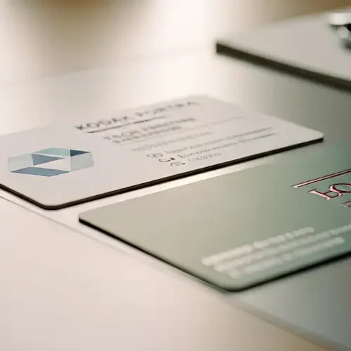 Close-up of professional business documents representing mergers and acquisitions legal services, including buy-side and sell-side transactions.